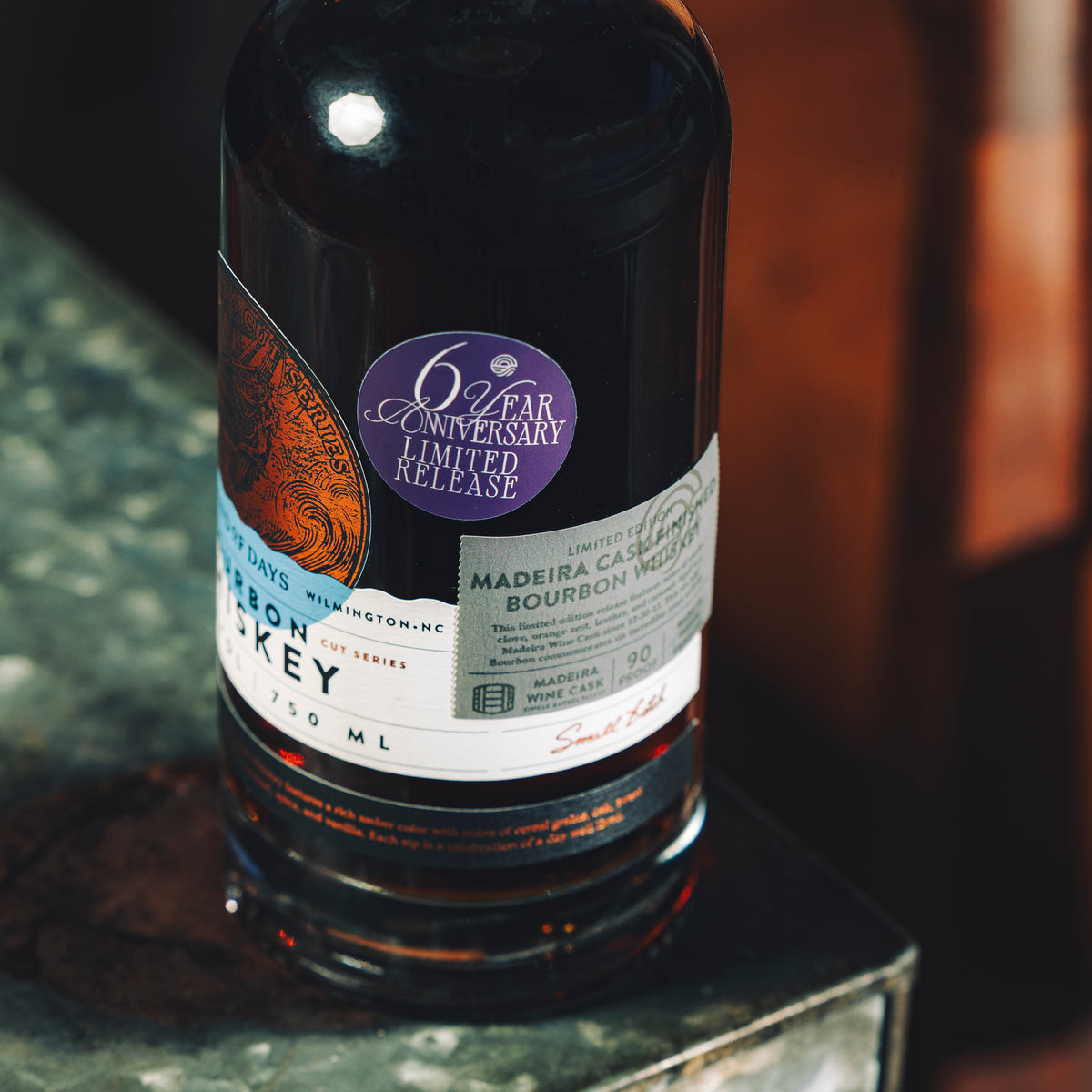 Madeira Cask Finished Bourbon Whiskey bottle, angled label view