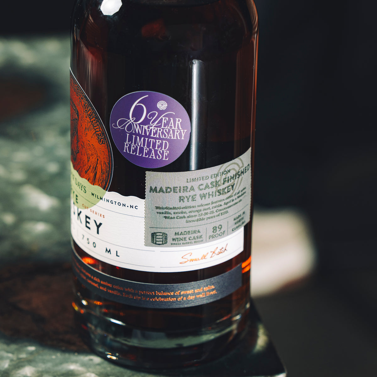 Madeira Cask Finished Rye Whiskey bottle, angled label view